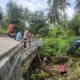Kapolsek Sekotong Pimpin Gotong Royong dan Monitoring di Desa Binaan